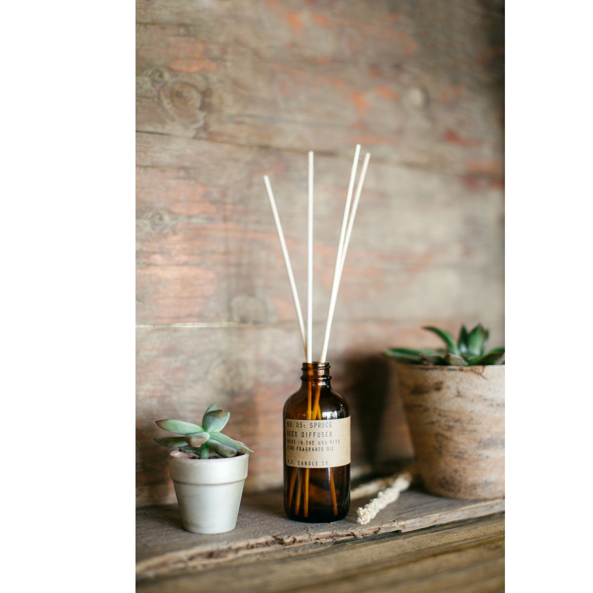 CB2 - December Catalogue 2019 - P.F. Candle Co. Teakwood and Tobacco Reed  Diffuser